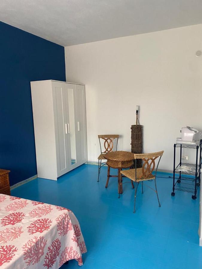 Le Stanze Del Mare Aparthotel Golfo Aranci Bagian luar foto