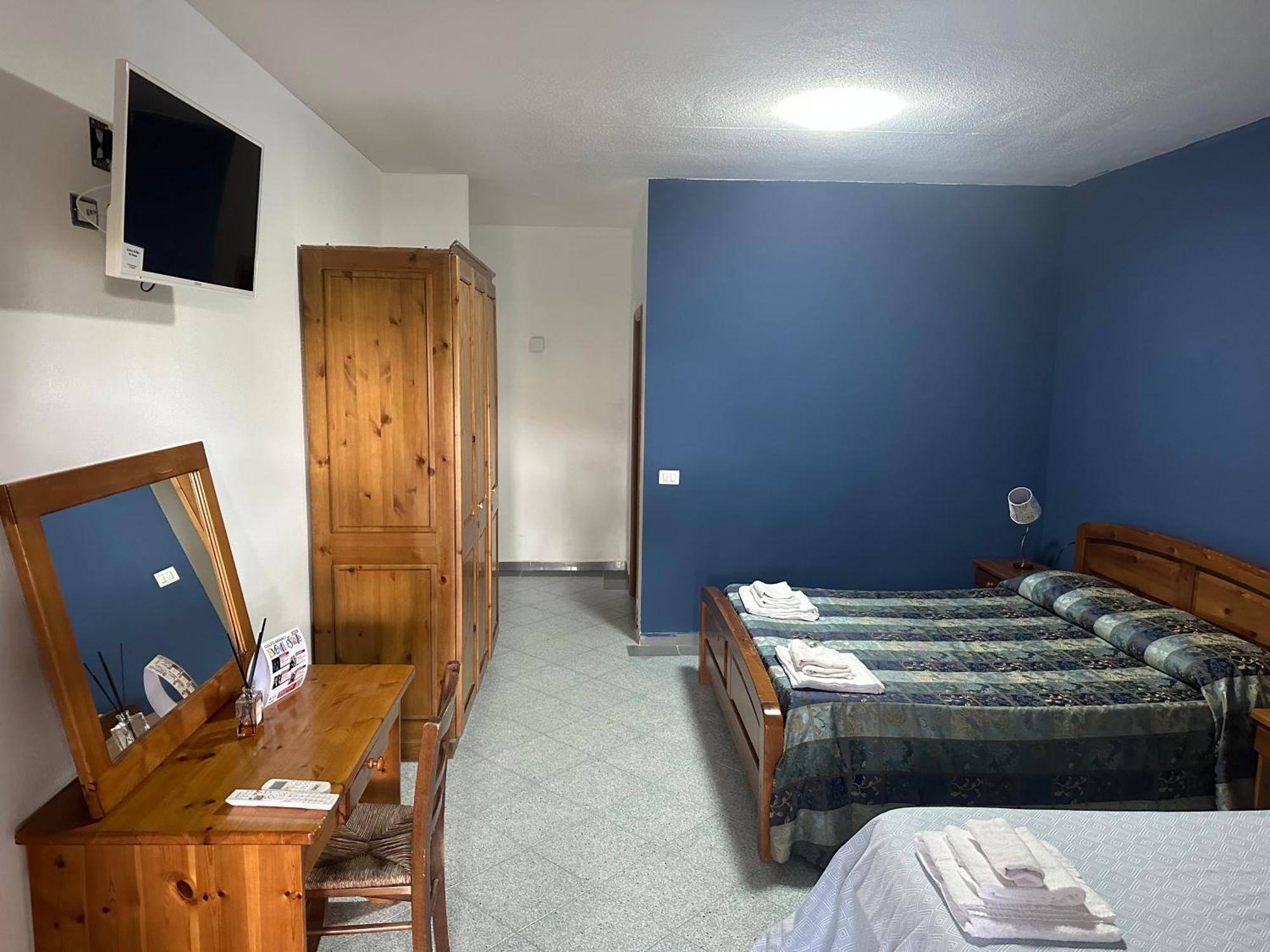 Le Stanze Del Mare Aparthotel Golfo Aranci Bagian luar foto
