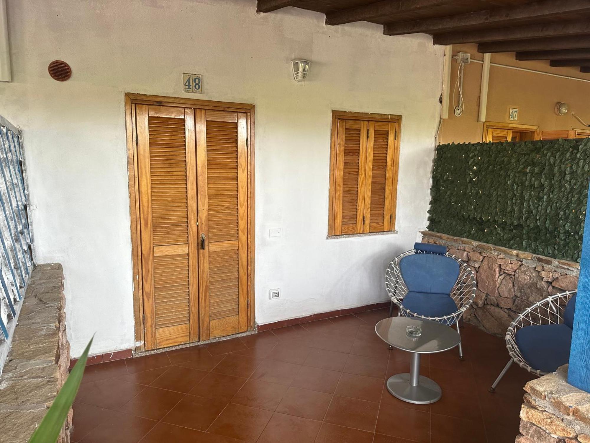 Le Stanze Del Mare Aparthotel Golfo Aranci Bagian luar foto