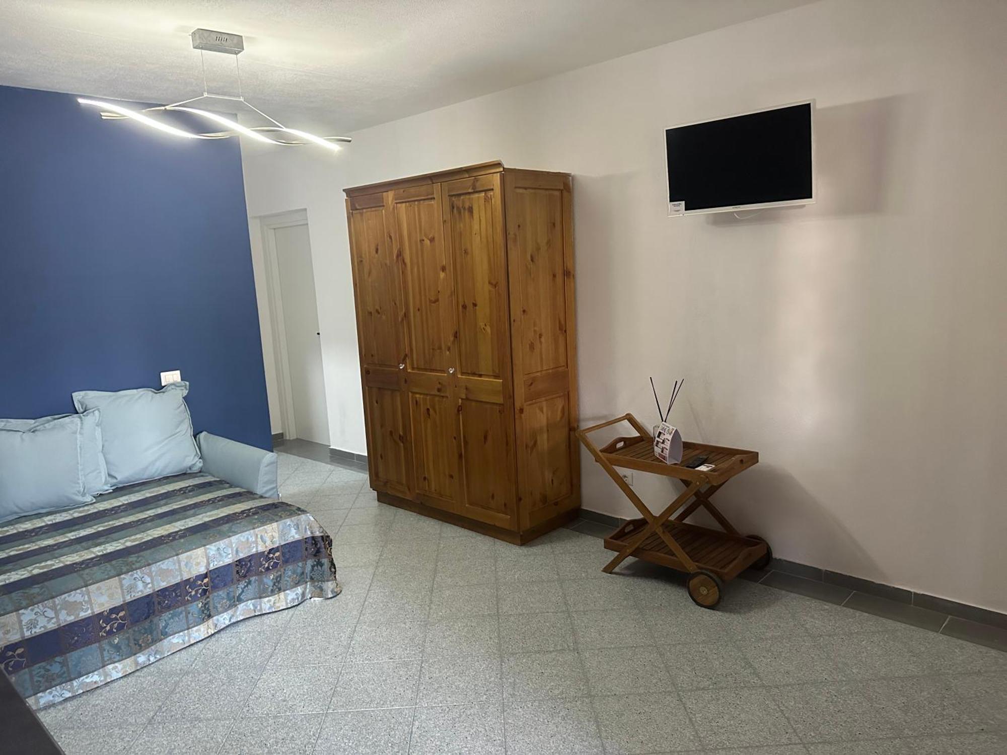 Le Stanze Del Mare Aparthotel Golfo Aranci Bagian luar foto