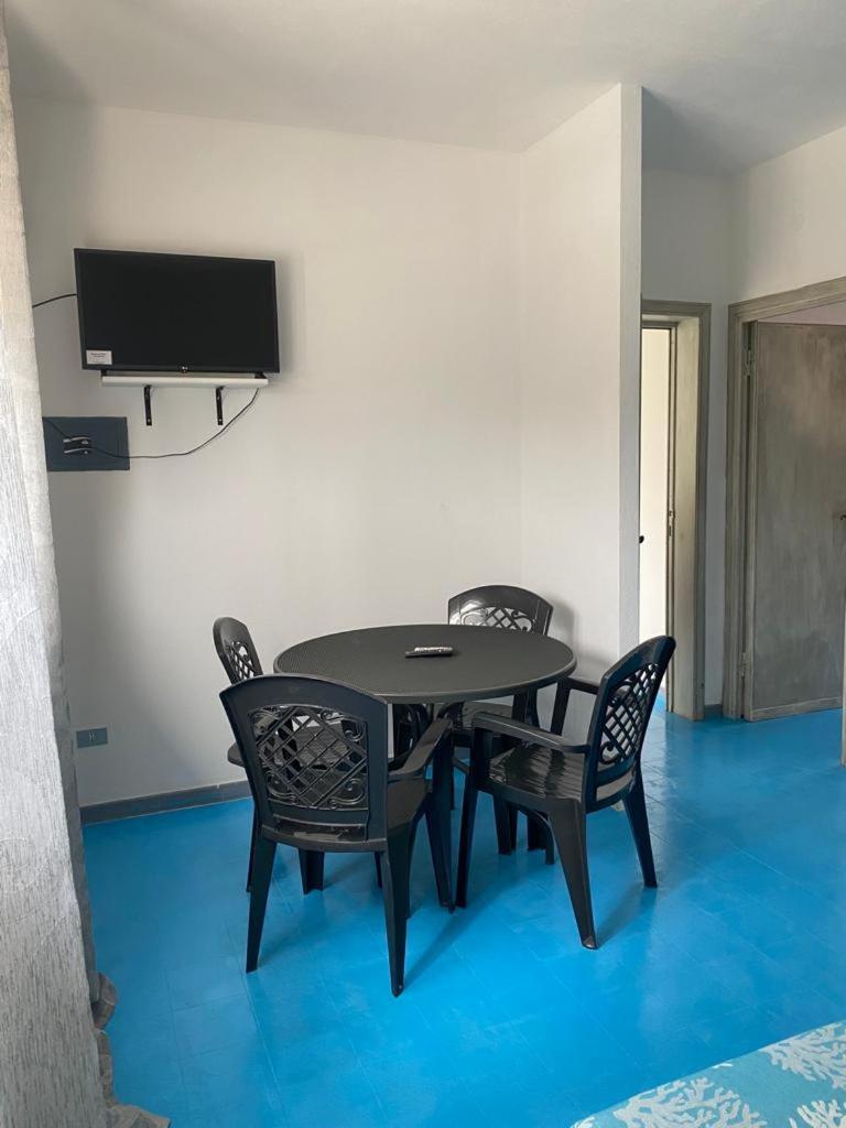 Le Stanze Del Mare Aparthotel Golfo Aranci Bagian luar foto