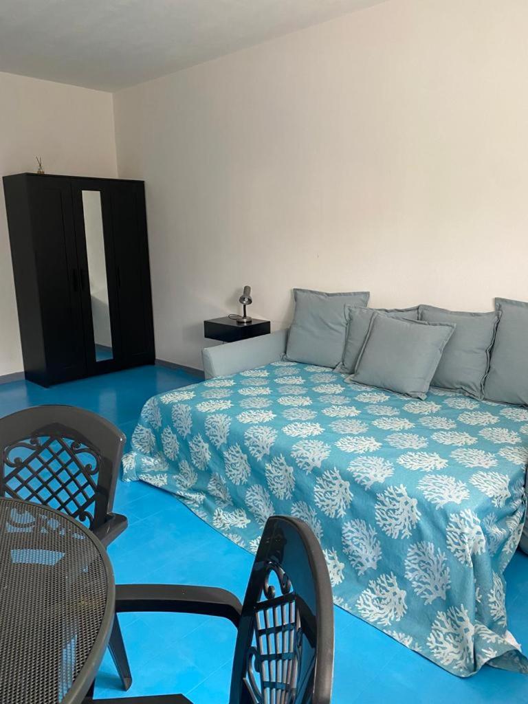 Le Stanze Del Mare Aparthotel Golfo Aranci Bagian luar foto