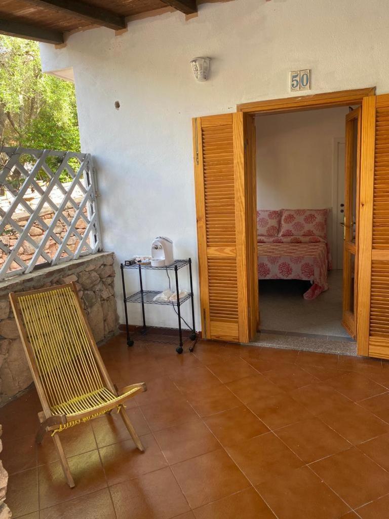 Le Stanze Del Mare Aparthotel Golfo Aranci Bagian luar foto