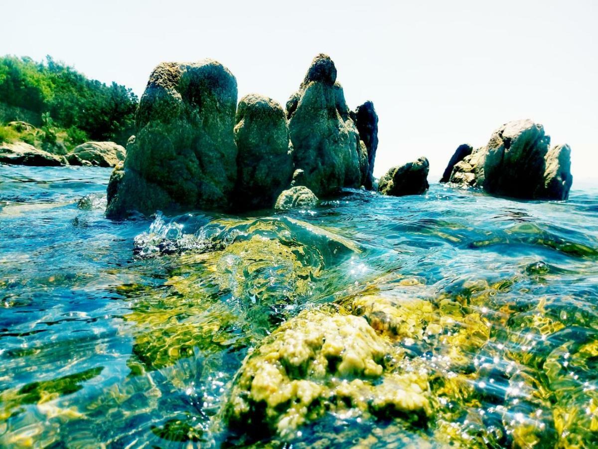 Le Stanze Del Mare Aparthotel Golfo Aranci Bagian luar foto